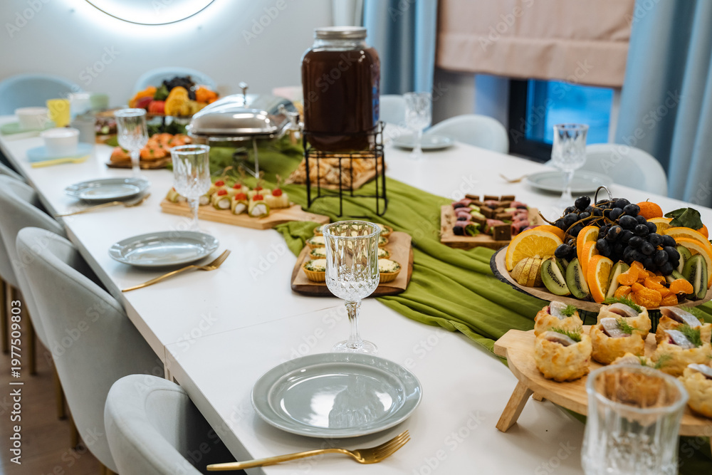 Fototapeta premium Elegant Meal Setting. Charming Breakfast Table Arrangement. Intimate Outdoor Style Dining Scene Described. Sophisticated Brunch Display With Fine Tableware And Natural Light