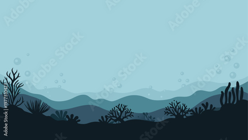 Silhouetted mountains and trees against a gradient blue sky at dusk