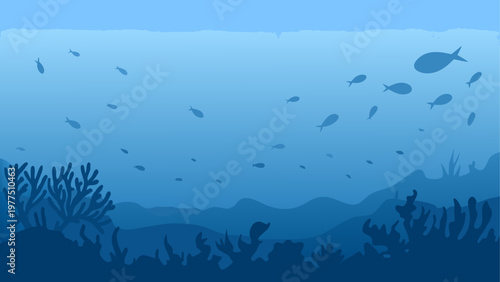 Flock of birds flying over a misty, hilly landscape at dusk