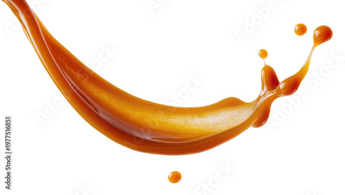 фотографія Golden caramel sauce splash with droplets, isolated on transparent background