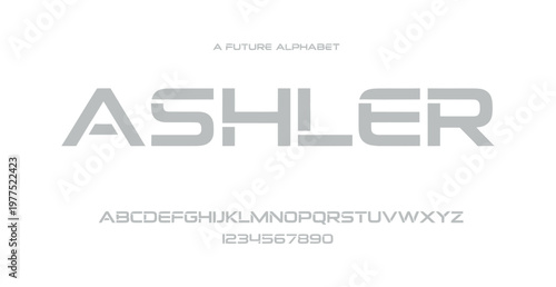 A futuristic alphabet design with the word ASHLER in large gray letters on a white background