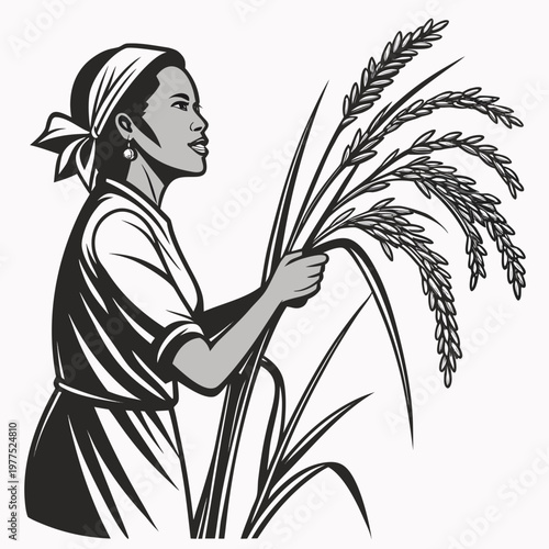 A woman in a headscarf holding rice plants