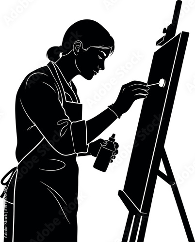 Title silhouette of a female artist painting at an easel a classic artistic scene description a striking black and white silhouette depicts a woman engrossed