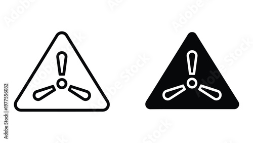 Contrast of radiation warning symbols in white and black triangle backgrounds