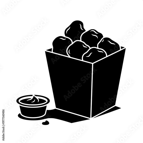 black square planter with fresh green artichokes and small watering can