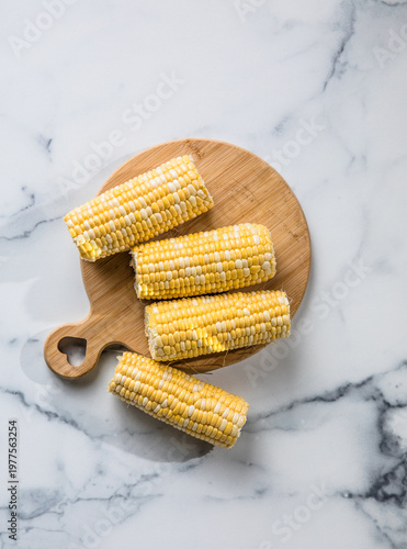 Closeup Ripe Fresh Corn on Table