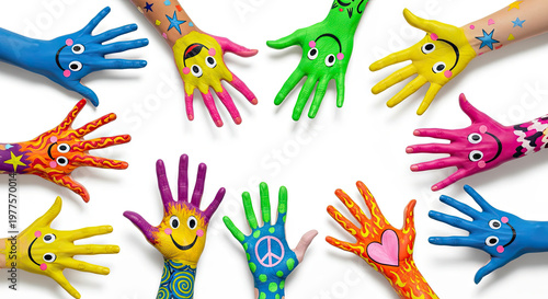 Colorful hands with smiley faces painted.