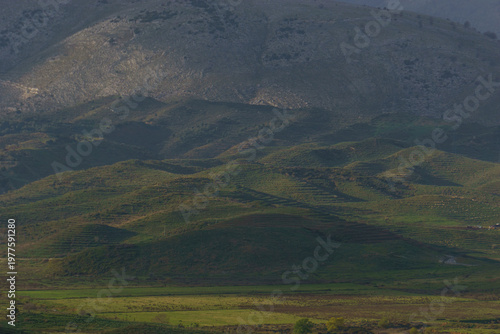 Detail of beautiful albanian landscape with mountains and hills in a valley, Finiq, Vlore, Albania