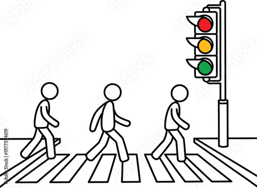 Pedestrians crossing the road at a signalized crosswalk during green light phase