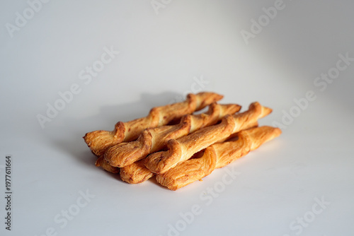 Puff pastry twists on a white background