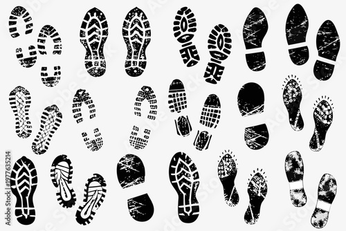 Collection of various black shoe and boot print silhouettes displayed