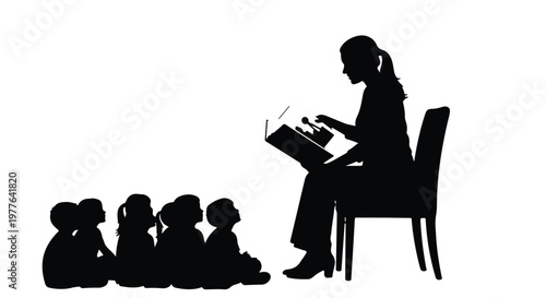 Silhouette of a teacher reading a story to a group of children
