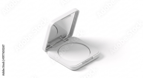 Cosmetic Compact with Mirror Opened Against White Surface in Studio Shot
