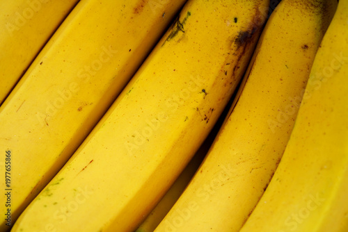 Macro Texture of Ripe Yellow Bananas, Abstract Organic Fruit Background with Diagonal Pattern