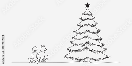 Person and dog with christmas tree.