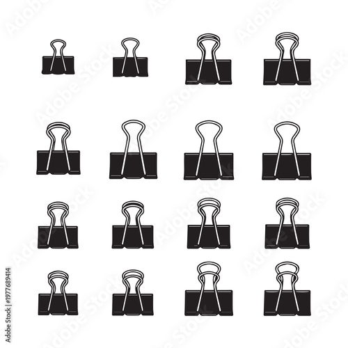 Binder clips in various sizes arranged in a grid pattern on a white background