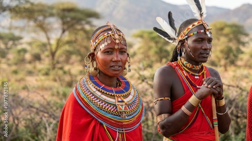 Maasai woman standing in a traditional Maasai boma, showcasing cultural heritage, vibrant attire, and rural lifestyle.