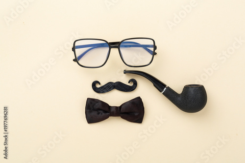 Happy Father's Day accessories on color background, top view