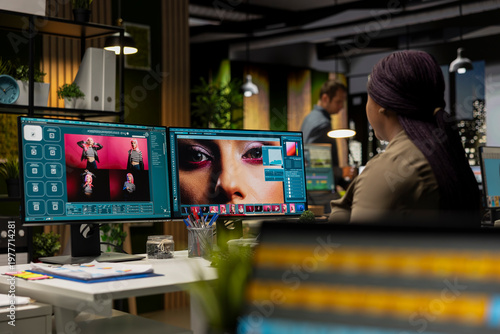 Valokuva Black woman editor using AI powered media content for image retouching, working on contrast adjustments