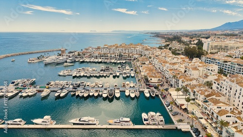 Puerto Banús marina aerial view with luxury yachts and waterfront, Marbella, Costa del Sol, Spain
