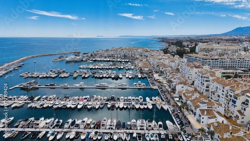 Puerto Banús marina aerial view with luxury yachts and waterfront, Marbella, Costa del Sol, Spain