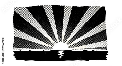 Silhouette of a sunrise over ocean with rays spreading across sky