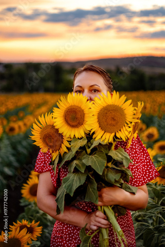 The girl among the sunflowers
