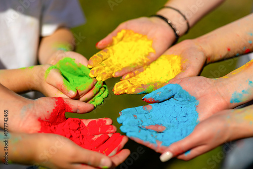 Hands in Holi colors