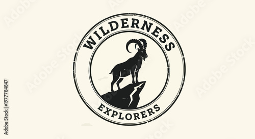 Wilderness Explorers Logo with Mountain Goat on Peak.