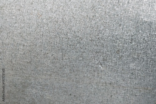 Foto Seamless gray galvanized steel sheet texture with zinc spangle pattern