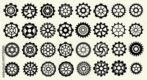 Collection of Diverse Black Gears and Cogs on Light Background - Industrial Design Elements