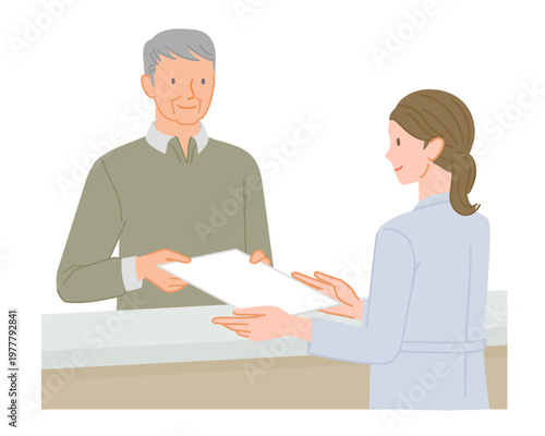 Senior man handing document at hospital reception to female staff