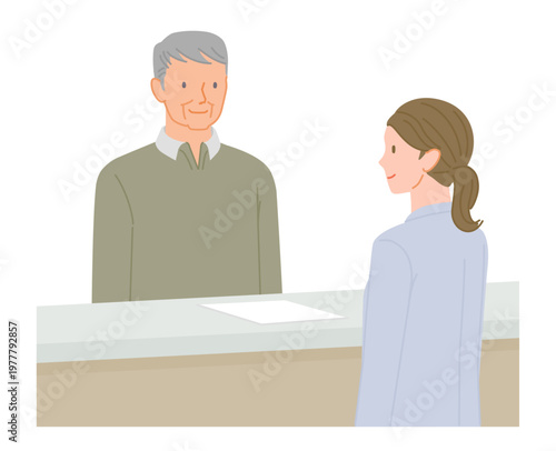 Senior man receiving assistance at hospital reception with female staff