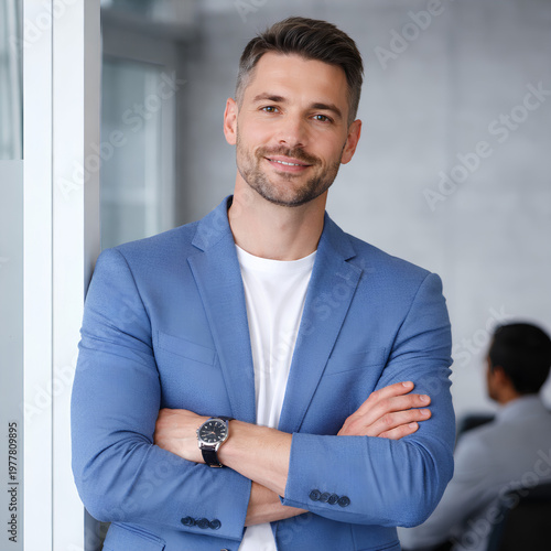 Confident businessman in a modern office.