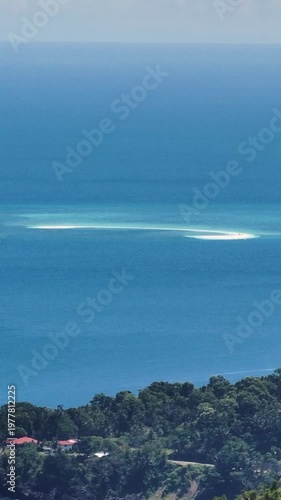 Wallpaper Mural White sandbar and blue sea in Camiguin Island. Philippines. Vertical, stories. Torontodigital.ca