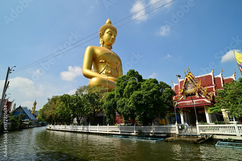The Phra Phutthathamakaya Thepmongkol at Wat Pak Nam is a Buddha statue in the meditation posture and standing 69 meters tall. It is the tallest Buddha statue in Bangkok. Located in Thailand.