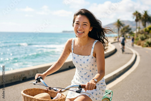 海沿いの道を自転車で走る笑顔の日本人女性の休日 Generative AI