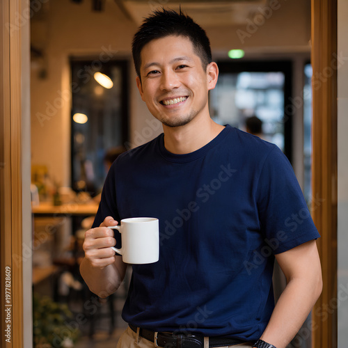 Smiling man with coffee in a cozy cafe.