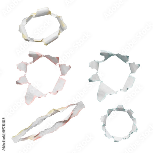 Photography Collection of irregularly torn paper pieces featuring various circular and oblong hole cut-outs