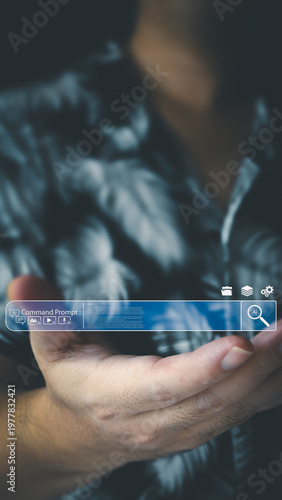 An open hand holds a virtual holographic command prompt search bar featuring AI icons for chat, image, video, and audio, illustrating smart technology.