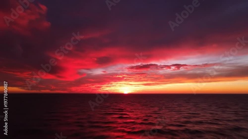 Breathtaking Red Sunset Over The Ocean Horizon
