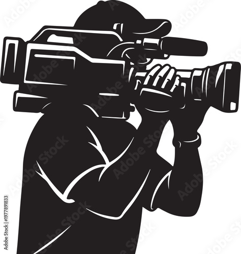 Silhouette of a cameraman filming with a large camera