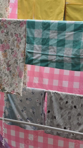 Assorted Fabric Patterns Hanging Outdoors With Soft Natural Lighting