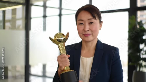 Woman Holding Award Trophy.