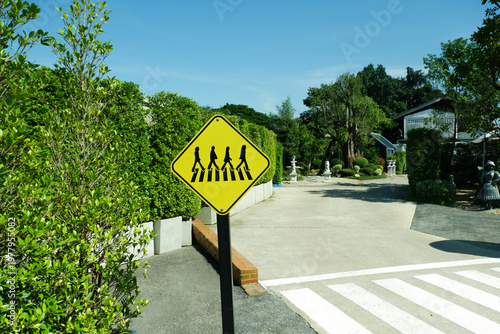 Yellow Traffic signs,sign symbolizes a school crossing zone,Pedestrian crossing,Directional, Traffic symbols,Zebra crossing concept.