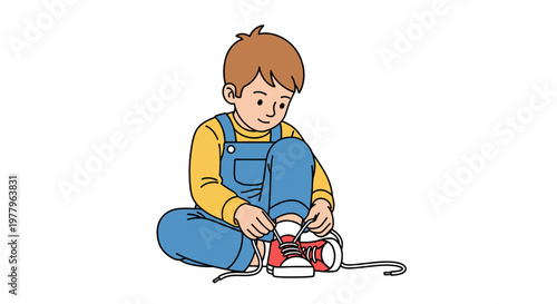 Little boy sitting on the floor and learning to tie his shoelaces.