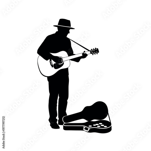 Silhouette of a Musician Playing Guitar on Street.