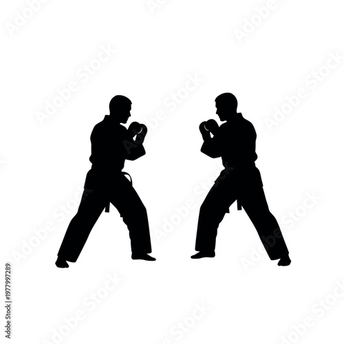 Silhouette of two martial artists in a fighting stance 1.