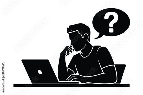 A man sits at a laptop with a questioning expression on his face