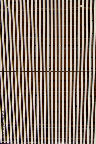 Modern architectural background suitable for concepts of interior design, transportation hubs, architecture. Abstract texture grey geometric pattern airport ceiling design with repetitive structure.